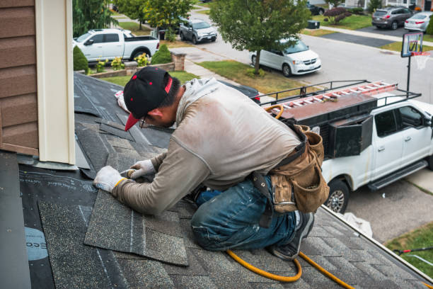 Professional Emergency Roof Repair technician working in Sharpes, FL